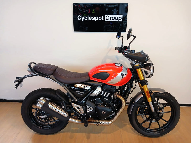 Load image into Gallery viewer, 2026 Triumph Scrambler 400 X in Baja Orange with 398cc engine, 39.5HP, 6-speed transmission, 150mm suspension travel and LAMS approval.