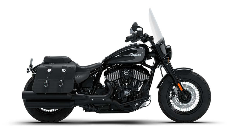 Load image into Gallery viewer, A black 2026 Indian Super Chief Dark Horse motorcycle with a tall clear windshield, black saddlebags, and chrome details, photographed from a side profile against a solid white background.
