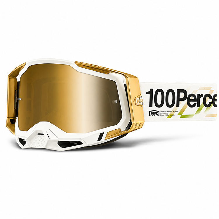 100% motocross goggles with gold mirrored lens, white and gold frame, and white branded strap.