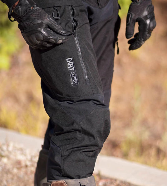 Premium black textile motorcycle riding pants featuring reinforced knee armour and abrasion-resistant panels, available at Cyclespot stores in Auckland, Taranaki, and Wellington. including Auckland and Wellington.