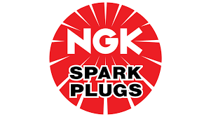 The classic NGK Spark Plugs logo in red and black, representing the world's number one choice for motorcycle ignition.