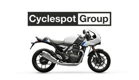 2026 Triumph Thruxton 400 cafe racer motorcycle with Cyclespot Group logo above it on a white background