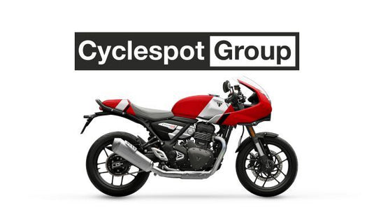 Red and silver 2026 Triumph Thruxton 400 cafe racer motorcycle with 'Cyclespot Group' logo above on a white background