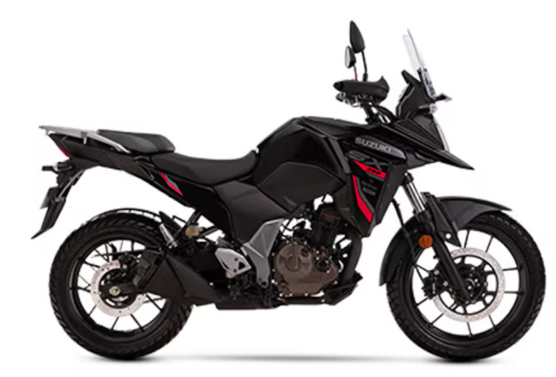 Load image into Gallery viewer, A black 2025 Suzuki V-Strom 250SX adventure motorcycle with red and silver accents, shown in a side profile on a white background.
