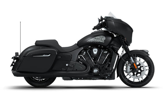 A black 2026 Indian Chieftain Dark Horse motorcycle with a large windshield, saddlebags, and a tall antenna, shown in profile against a white background.