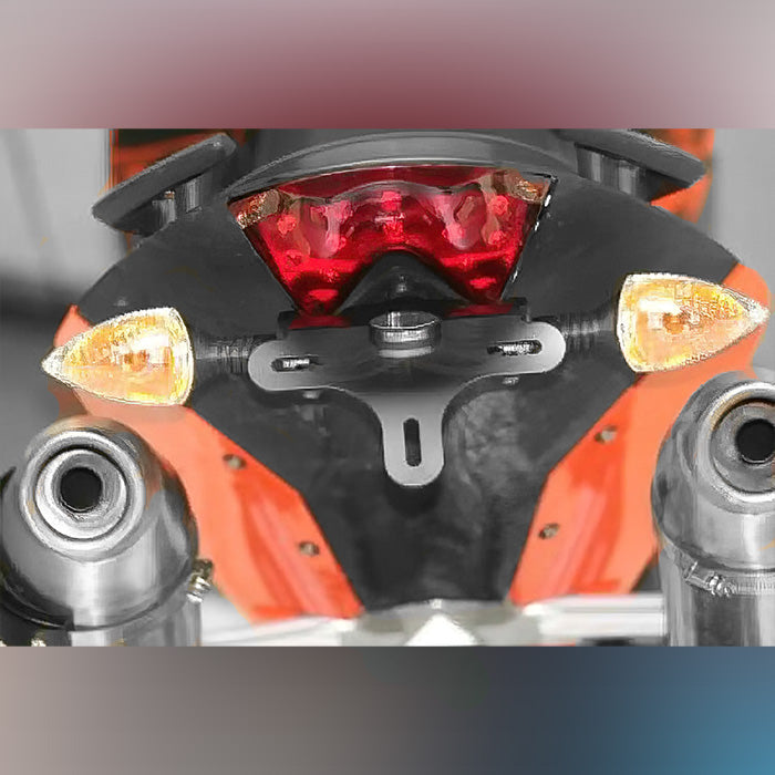 Load image into Gallery viewer, Tail Tidy/Licence Plate Holder! Suitable for the KTM 690 Duke III '08-'11 and the 690SM (all years), this Tail Tidy incorporates our replacement Tail Tidy light. Note: This Tail Tidy will not fit with "hi-level Akrapovic" exhaust and standard UK siz
